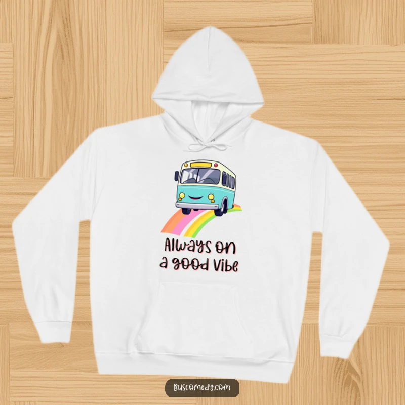 Funny and cozy hoodie featuring a smiling bus on a bright rainbow, perfect for spreading good vibes.