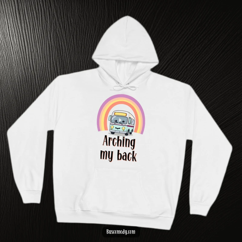 Funny kawaii bus character with a big smile, joyfully driving through a vibrant rainbow arch, printed on a soft and warm hoodie.