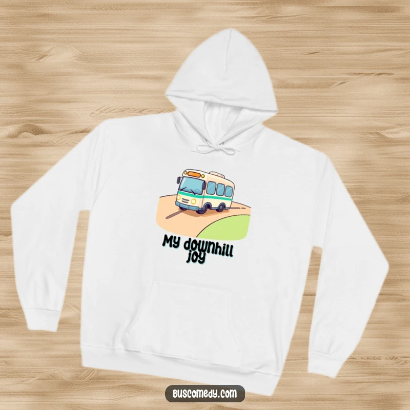 Funny hoodie showing a cute bus character rolling down a hill, its headlights twinkling brightly with sheer excitement and a hint of mischief.