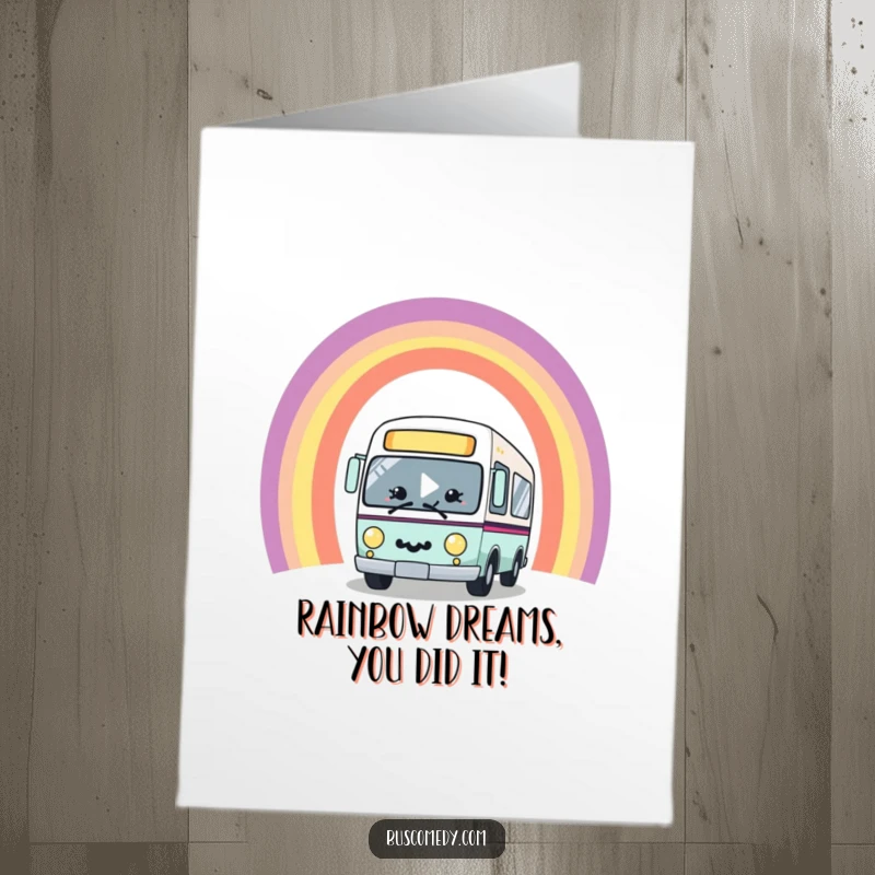 Funny Free Printable Congrats Card: A smiling bus travels through a bright rainbow arch, celebrating.